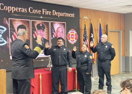 Firefighters Nick Davis, Carol Ballesteros, and Cole Ingram take their oaths of office as they are promoted to the rank of Captain with the Copperas Cove Fire Department. 