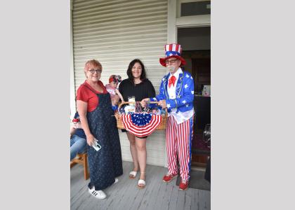 John Gallen, dressed as Uncle Sam, awards a prize basket at last year’s 4th of July Celebration at Allin House. This year’s celebration is set for 10 a.m. until 2 p.m. on Saturday, July 4.