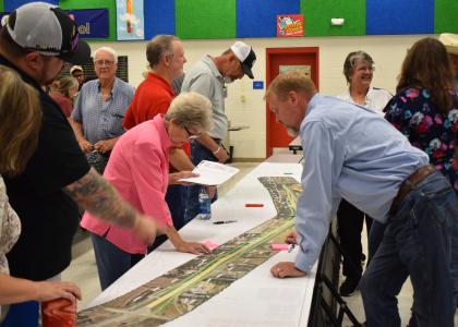 File Photo -- Local residents check out the I-14 expansion at a prior public meeting. This month, three will be held in Copperas Cove, Lampasas, and Lometa. 